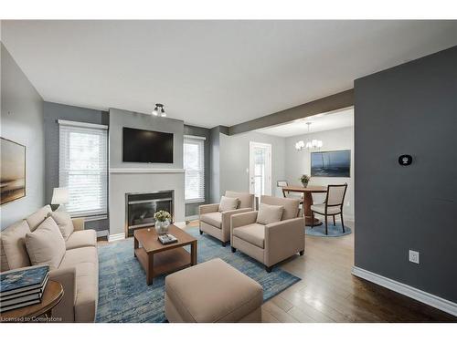 40-1199 Hamilton Road, London, ON - Indoor Photo Showing Living Room With Fireplace