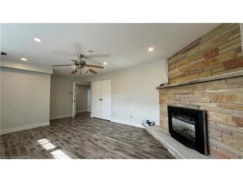 1-406 Erb Street W, Waterloo, ON - Indoor Photo Showing Living Room With Fireplace