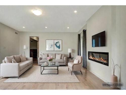 95 Georgina Street, Kitchener, ON - Indoor Photo Showing Living Room With Fireplace