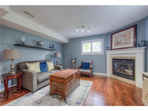 99 Bluerock Crescent, Cambridge, ON - Indoor Photo Showing Living Room With Fireplace