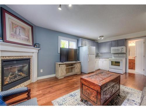 99 Bluerock Crescent, Cambridge, ON - Indoor Photo Showing Living Room With Fireplace