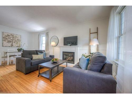 51 Crombie Street, Cambridge, ON - Indoor Photo Showing Living Room With Fireplace