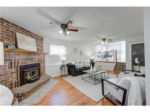 26 Bourbon Lane, London, ON - Indoor Photo Showing Living Room With Fireplace