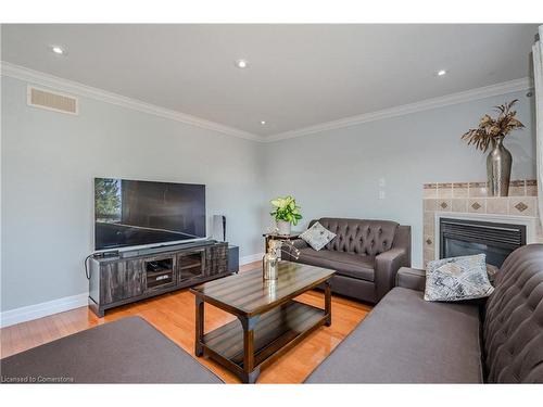 102 Flaherty Drive, Guelph, ON - Indoor Photo Showing Living Room With Fireplace