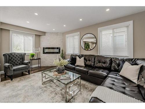 517 Peach Blossom Court, Kitchener, ON - Indoor Photo Showing Living Room With Fireplace