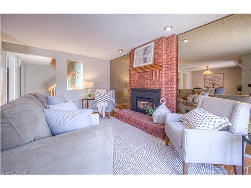 13-192 Alpine Road, Kitchener, ON - Indoor Photo Showing Living Room With Fireplace