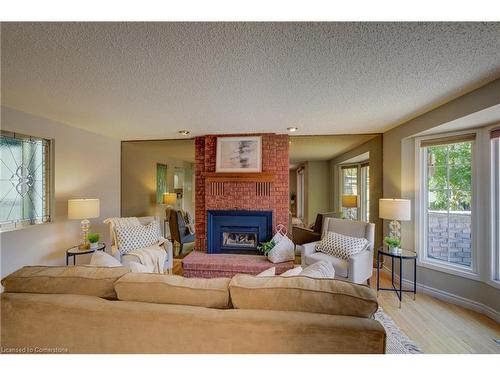 13-192 Alpine Road, Kitchener, ON - Indoor Photo Showing Living Room With Fireplace