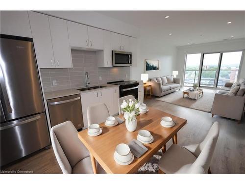 1004-50 Grand Avenue S, Cambridge, ON - Indoor Photo Showing Kitchen With Stainless Steel Kitchen With Double Sink With Upgraded Kitchen