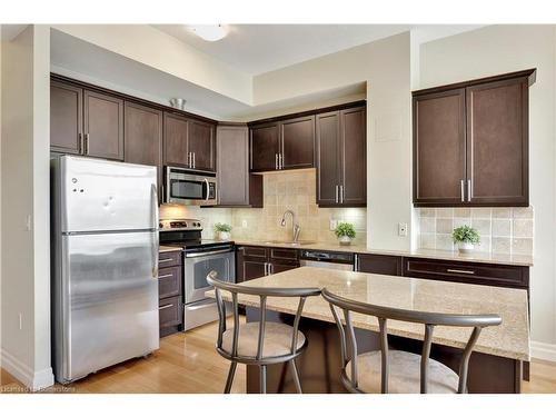 307-42 Bridgeport Road E, Waterloo, ON - Indoor Photo Showing Kitchen With Stainless Steel Kitchen