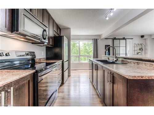 1-20 Westmount Road W, Kitchener, ON - Indoor Photo Showing Kitchen With Double Sink