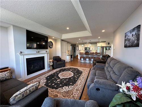 480 Grand Trunk Street, Palmerston, ON - Indoor Photo Showing Living Room With Fireplace