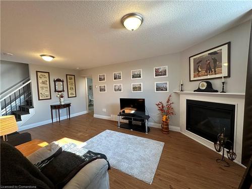 480 Grand Trunk Street, Palmerston, ON - Indoor Photo Showing Living Room With Fireplace