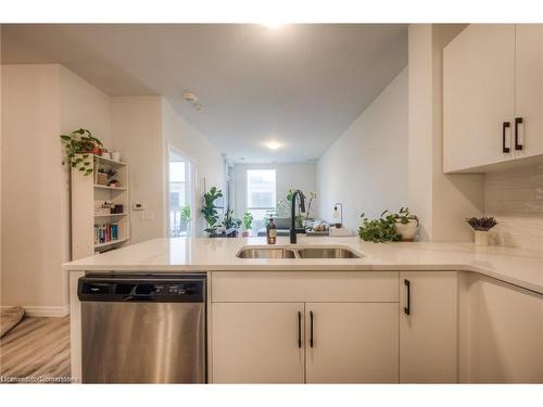 307-60 Charles Street W, Kitchener, ON - Indoor Photo Showing Kitchen With Double Sink