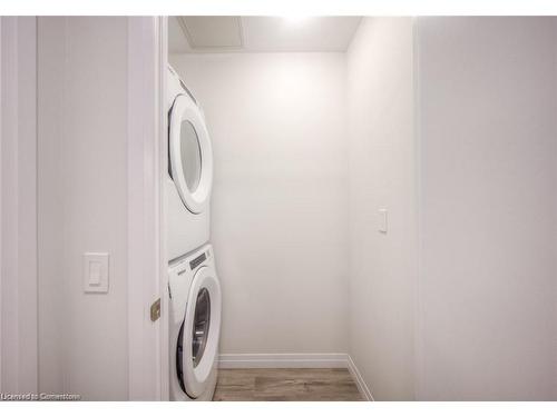 307-60 Charles Street W, Kitchener, ON - Indoor Photo Showing Laundry Room