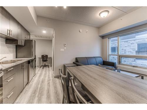 B404-275 Larch Street, Waterloo, ON - Indoor Photo Showing Kitchen With Double Sink