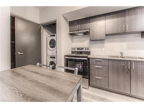 B404-275 Larch Street, Waterloo, ON - Indoor Photo Showing Kitchen With Double Sink