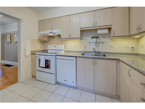 202 Queensdale Avenue, Toronto, ON - Indoor Photo Showing Kitchen With Double Sink