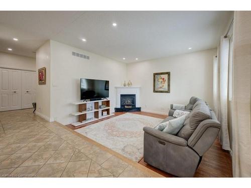 58 West Acres Crescent, Kitchener, ON - Indoor Photo Showing Living Room With Fireplace