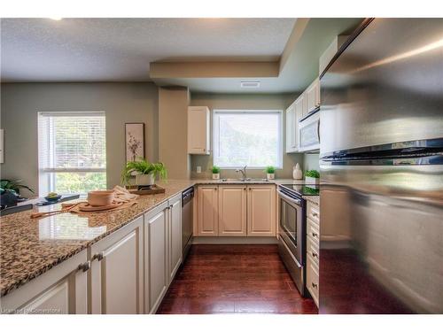 311-170 Water Street N, Cambridge, ON - Indoor Photo Showing Kitchen With Double Sink