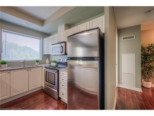 311-170 Water Street N, Cambridge, ON - Indoor Photo Showing Kitchen With Double Sink