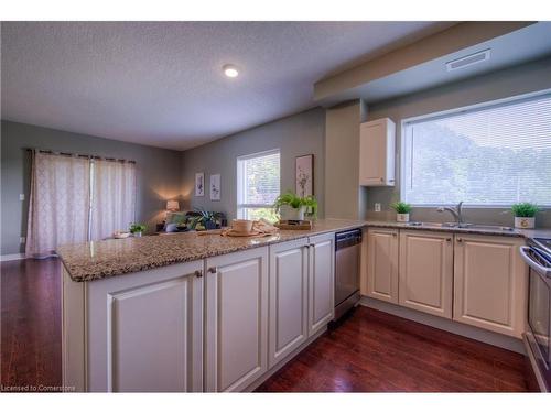 311-170 Water Street N, Cambridge, ON - Indoor Photo Showing Kitchen With Double Sink