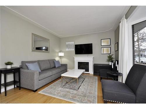 222 Anne Street, Cambridge, ON - Indoor Photo Showing Living Room With Fireplace