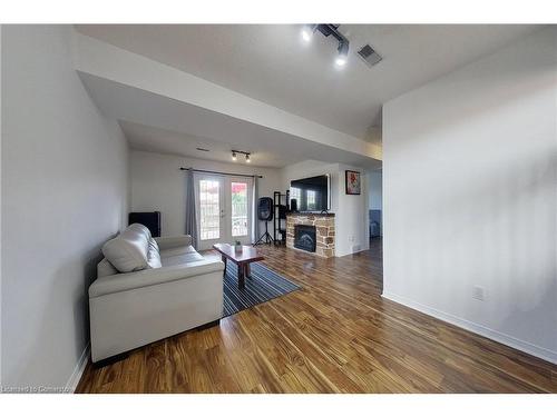 80 Burnham Court, Stratford, ON - Indoor Photo Showing Living Room With Fireplace