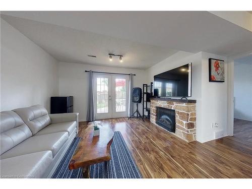 80 Burnham Court, Stratford, ON - Indoor Photo Showing Living Room With Fireplace