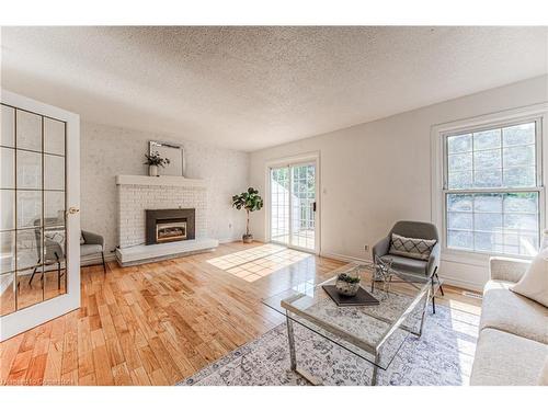 572 Strasburg Road, Kitchener, ON - Indoor Photo Showing Living Room With Fireplace