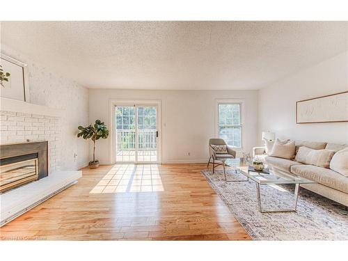 572 Strasburg Road, Kitchener, ON - Indoor Photo Showing Living Room With Fireplace