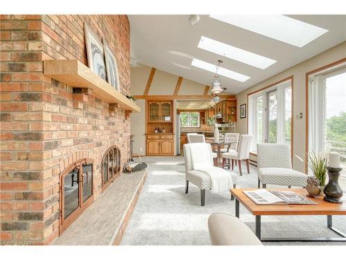 1275 Village Road, North Dumfries, ON - Indoor Photo Showing Living Room With Fireplace