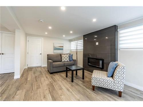 34 Dooley Drive, Kitchener, ON - Indoor Photo Showing Living Room With Fireplace