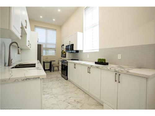 34 Dooley Drive, Kitchener, ON - Indoor Photo Showing Kitchen With Upgraded Kitchen