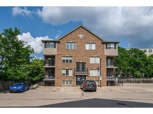 E38-12 Holborn Drive, Kitchener, ON - Outdoor With Facade