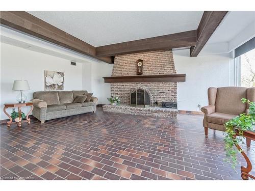 803-225 Harvard Place, Waterloo, ON - Indoor Photo Showing Living Room With Fireplace