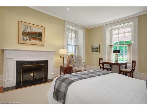 1438 Greenfield Road, Cambridge, ON - Indoor Photo Showing Bedroom With Fireplace