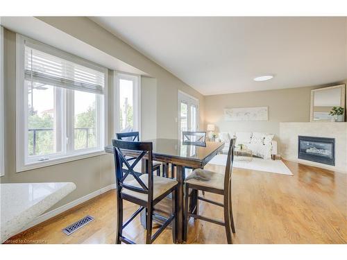 8 Munroe Crescent, Guelph, ON - Indoor Photo Showing Dining Room With Fireplace