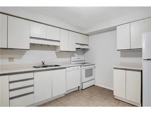 1501-55 Green Valley Drive, Kitchener, ON - Indoor Photo Showing Kitchen With Double Sink