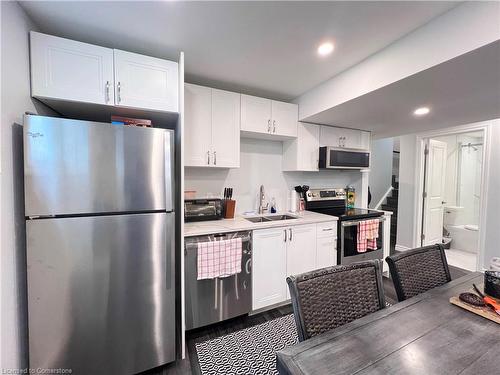 B-321 Carriage Way N, Waterloo, ON - Indoor Photo Showing Kitchen With Double Sink