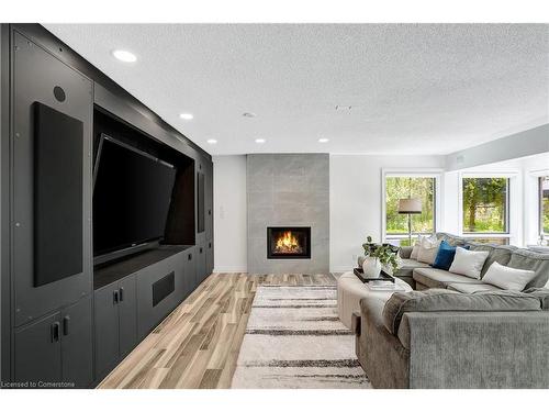 2 Pioneer Grove Road, Puslinch, ON - Indoor Photo Showing Living Room With Fireplace