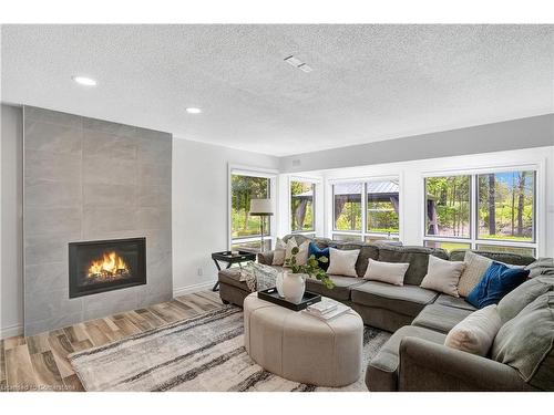 2 Pioneer Grove Road, Puslinch, ON - Indoor Photo Showing Living Room With Fireplace