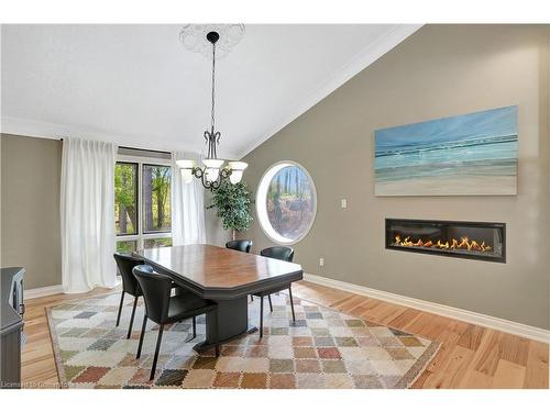 2 Pioneer Grove Road, Puslinch, ON - Indoor Photo Showing Dining Room With Fireplace