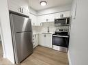 11-203 Mausser Avenue, Kitchener, ON  - Indoor Photo Showing Kitchen With Stainless Steel Kitchen With Double Sink 