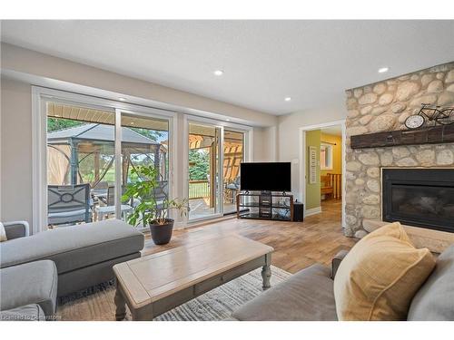 728 Country Squire Road, Waterloo, ON - Indoor Photo Showing Living Room With Fireplace