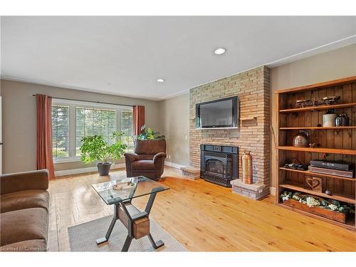 728 Country Squire Road, Waterloo, ON - Indoor Photo Showing Living Room With Fireplace