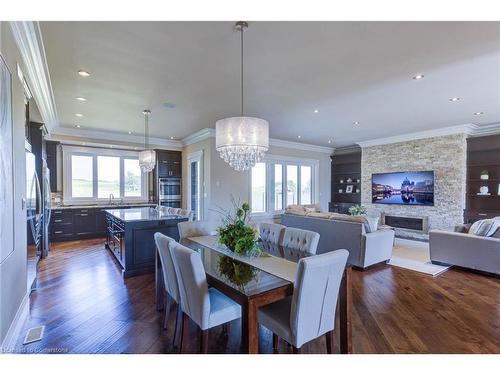 1123 Notre Dame Drive, Petersburg, ON - Indoor Photo Showing Dining Room With Fireplace