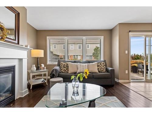 38 Manhattan Circle, Cambridge, ON - Indoor Photo Showing Living Room With Fireplace