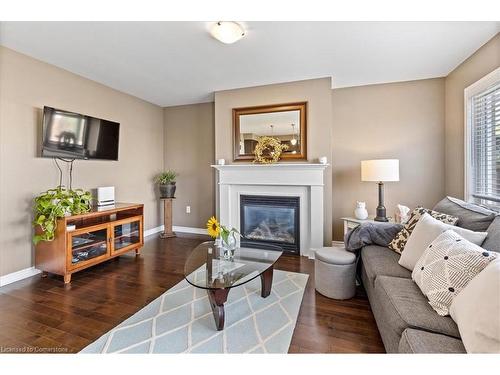 38 Manhattan Circle, Cambridge, ON - Indoor Photo Showing Living Room With Fireplace