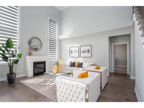 785 Sundrops Court, Waterloo, ON - Indoor Photo Showing Living Room With Fireplace