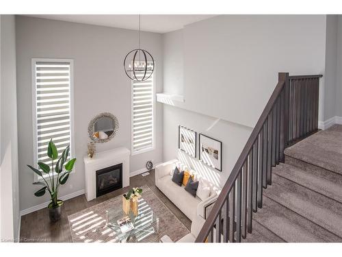 785 Sundrops Court, Waterloo, ON - Indoor Photo Showing Other Room With Fireplace